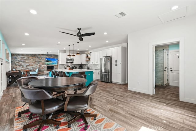 4941 Catamaran St, Oxnard, CA 93035 - dining area featuring a ceiling fan, light wood-style flooring, recessed lighting, and baseboards