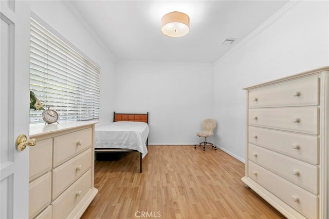 5741 Tobias Ave, Sherman Oaks, CA 91411 - bedroom featuring light wood-style floors and ornamental molding