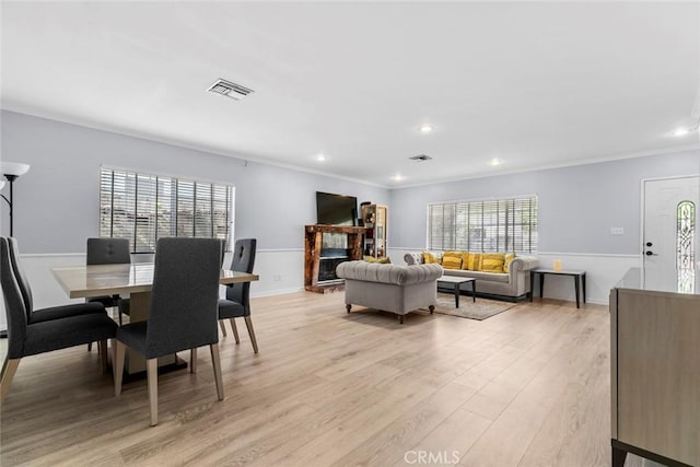5741 Tobias Ave, Sherman Oaks, CA 91411 - dining space featuring light wood-type flooring, plenty of natural light, crown molding, and recessed lighting