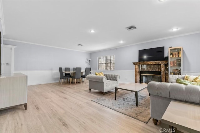5741 Tobias Ave, Sherman Oaks, CA 91411 - living room with crown molding, wood finished floors, a fireplace, recessed lighting, and baseboards