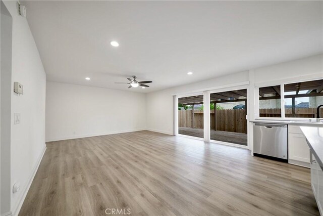 8190 Crowley Cir, Buena Park, CA 90621 - unfurnished living room featuring light wood-style flooring, recessed lighting, and a ceiling fan