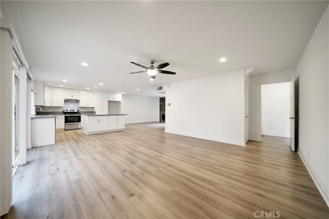8190 Crowley Cir, Buena Park, CA 90621 - unfurnished living room featuring a ceiling fan, recessed lighting, and light wood finished floors