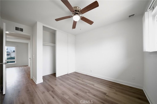 8190 Crowley Cir, Buena Park, CA 90621 - unfurnished bedroom featuring wood finished floors, a closet, and ceiling fan