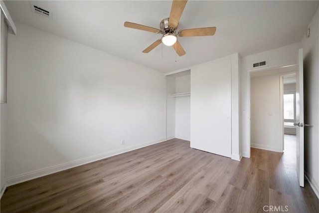 8190 Crowley Cir, Buena Park, CA 90621 - unfurnished bedroom with wood finished floors, a closet, and a ceiling fan