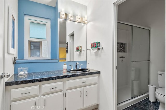 4900 E Chapman Ave Unit 102, Orange, CA 92869 - bathroom featuring toilet, a shower stall, and vanity