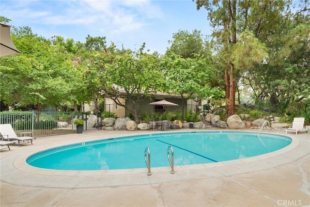4900 E Chapman Ave Unit 102, Orange, CA 92869 - community pool featuring a patio area