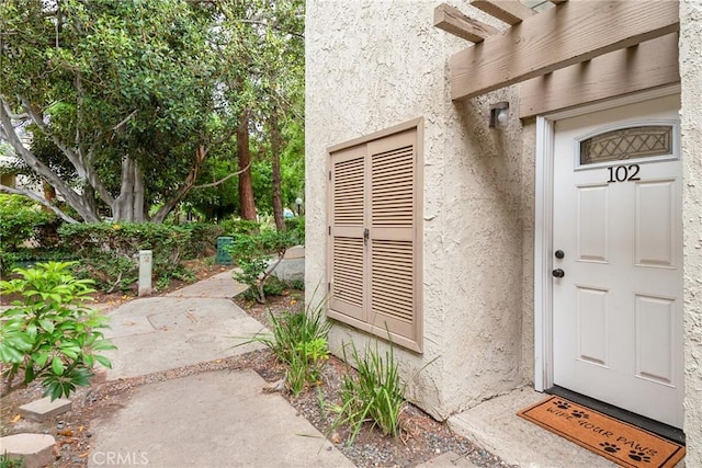 4900 E Chapman Ave Unit 102, Orange, CA 92869 - entrance to property featuring stucco siding