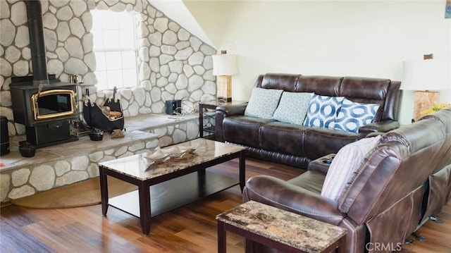 32455 Scandia Dr, Running Springs, CA 92382 - living area featuring a wood stove, lofted ceiling, and wood finished floors