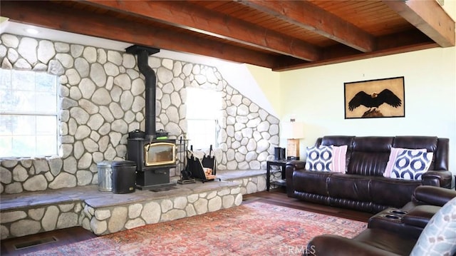 32455 Scandia Dr, Running Springs, CA 92382 - living room with a wood stove, wood finished floors, and beamed ceiling