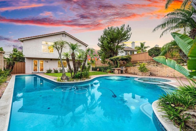 12032 Caneridge Rd, San Diego, CA 92128 - view of pool featuring an in-ground hot tub, french doors, and a fenced backyard