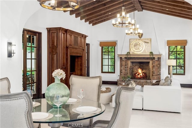 20 Cactus, Irvine, CA 92603 - dining area with a chandelier, beam ceiling, high vaulted ceiling, and a fireplace