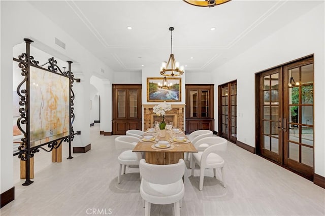 20 Cactus, Irvine, CA 92603 - dining room with french doors, a chandelier, baseboards, arched walkways, and recessed lighting