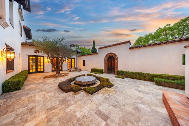 20 Cactus, Irvine, CA 92603 - patio terrace at dusk featuring french doors and a patio