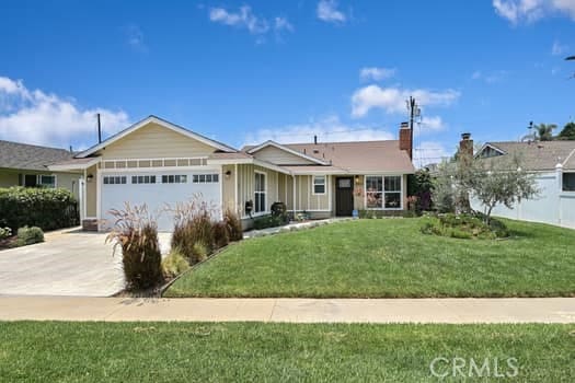 4503 Bannister Ave, El Monte, CA 91732 - single story home featuring concrete driveway, an attached garage, a front yard, and a chimney