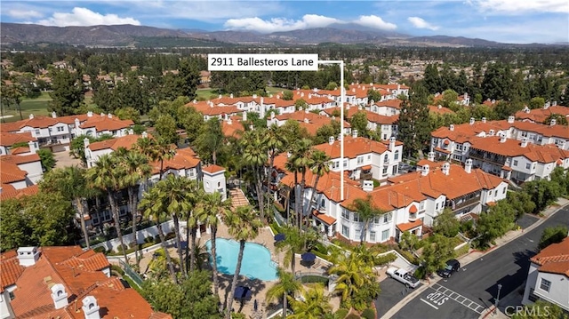 2911 Ballesteros Ln, Tustin, CA 92782 - aerial view of a mountain backdrop and a pool