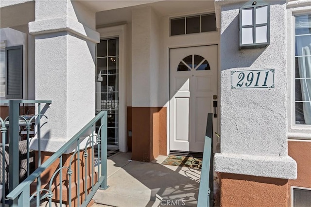 2911 Ballesteros Ln, Tustin, CA 92782 - property entrance featuring stucco siding