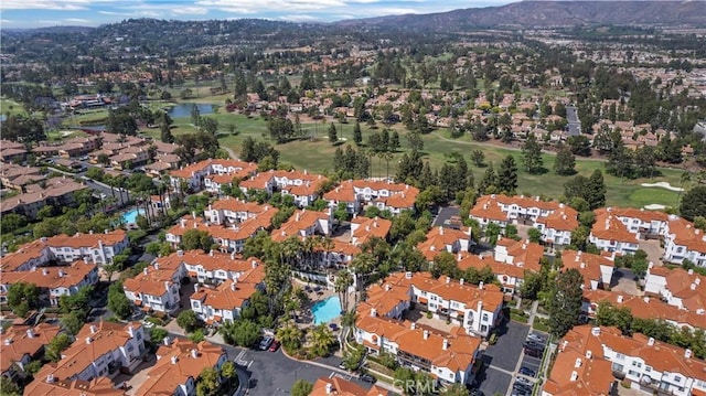 2911 Ballesteros Ln, Tustin, CA 92782 - aerial view of property and surrounding area featuring a golf club and a water and mountain view