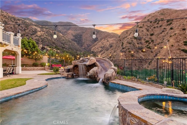 2514 Bulrush Cir, Corona, CA 92882 - view of swimming pool with a mountain view, a patio area, and a pool with connected hot tub