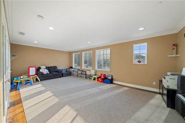 2514 Bulrush Cir, Corona, CA 92882 - playroom with crown molding, baseboards, recessed lighting, and light carpet