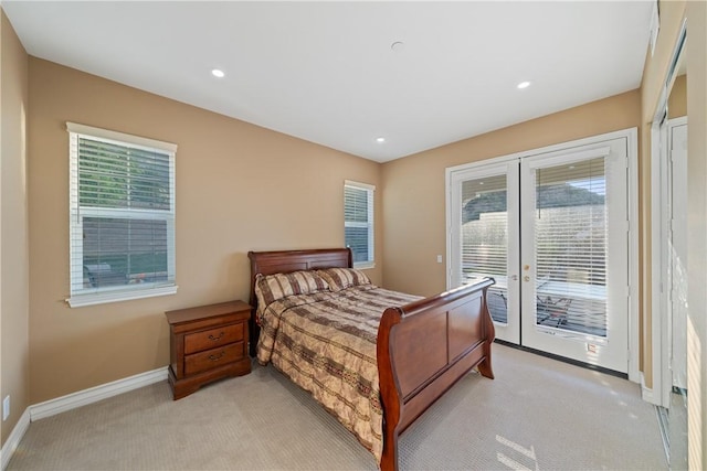 2514 Bulrush Cir, Corona, CA 92882 - bedroom with french doors, light colored carpet, access to exterior, multiple windows, and recessed lighting