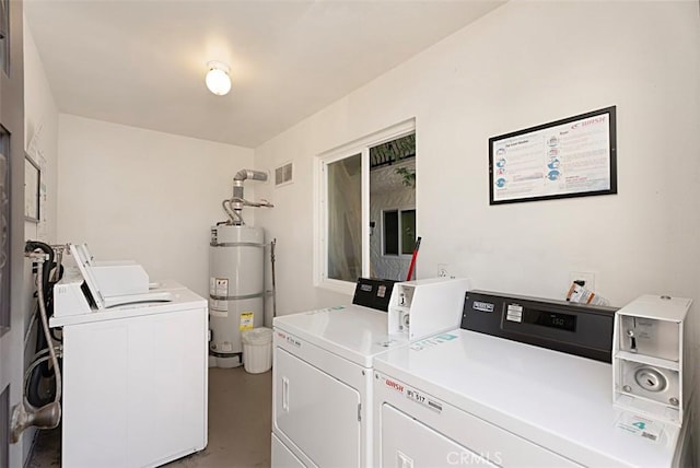 2175 S Coast Hwy Unit 16, Laguna Beach, CA 92651 - shared laundry featuring washer and dryer and strapped water heater
