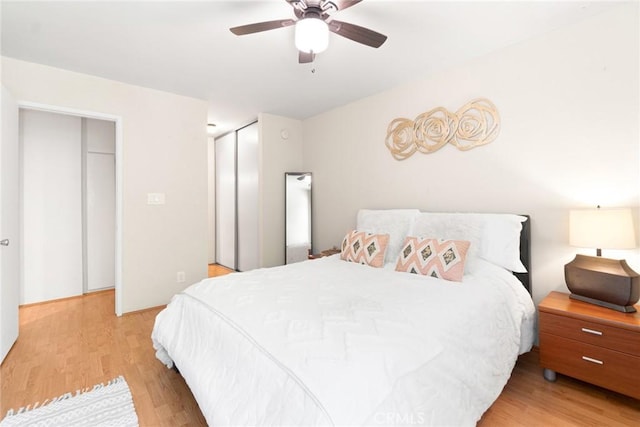 4727 W 147th St Unit 225, Lawndale, CA 90260 - bedroom with light wood-style flooring, ceiling fan, and a closet