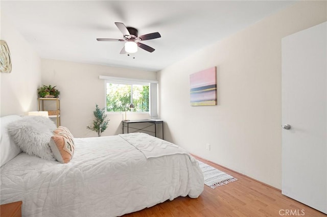 4727 W 147th St Unit 225, Lawndale, CA 90260 - bedroom with wood finished floors and ceiling fan