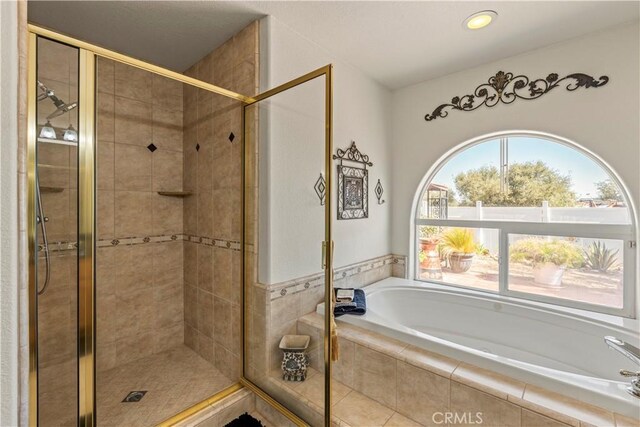 9098 Rattlesnake Rd, Phelan, CA 92371 - full bath with a garden tub, a stall shower, and recessed lighting
