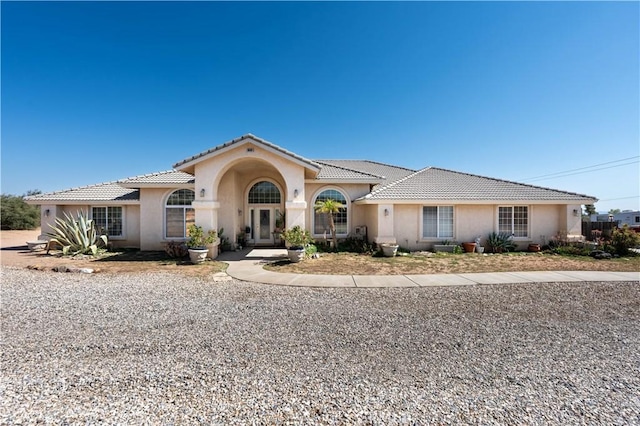 9098 Rattlesnake Rd, Phelan, CA 92371 - mediterranean / spanish-style home featuring stucco siding and a tile roof