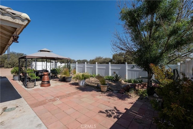 9098 Rattlesnake Rd, Phelan, CA 92371 - fenced backyard featuring a gazebo and a patio