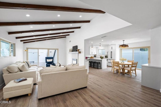 4834 Island View St, Oxnard, CA 93035 - living area with recessed lighting, light wood-style flooring, and beam ceiling
