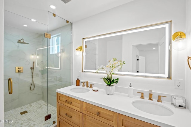 4834 Island View St, Oxnard, CA 93035 - full bath with a marble finish shower, double vanity, and recessed lighting