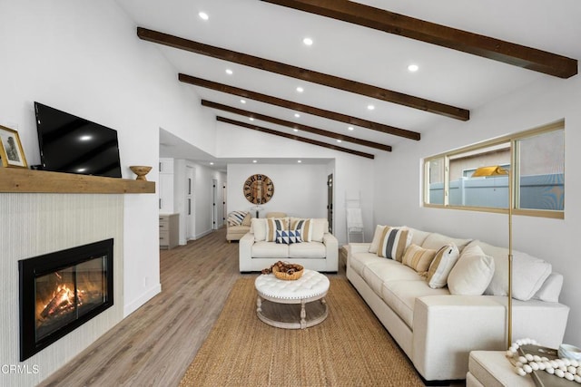 4834 Island View St, Oxnard, CA 93035 - living room with recessed lighting, wood finished floors, and a glass covered fireplace