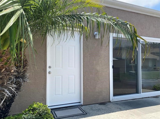 44516 La Paz Rd, Temecula, CA 92592 - doorway to property with stucco siding