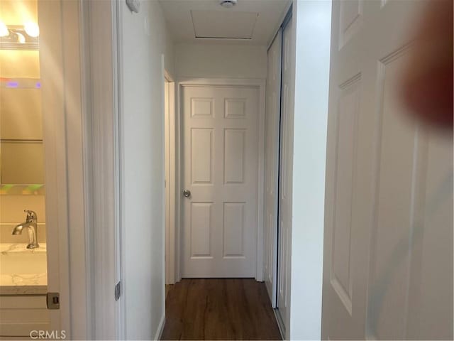 44516 La Paz Rd, Temecula, CA 92592 - hall featuring dark wood-style flooring and a sink