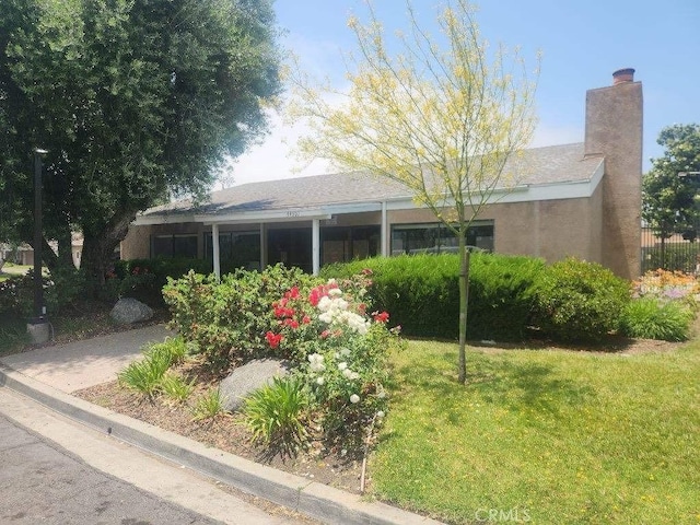 44516 La Paz Rd, Temecula, CA 92592 - view of front of house featuring a front yard and a chimney