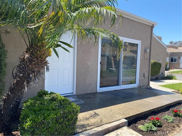 44516 La Paz Rd, Temecula, CA 92592 - doorway to property featuring stucco siding