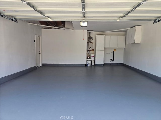 44516 La Paz Rd, Temecula, CA 92592 - garage featuring a garage door opener and water heater