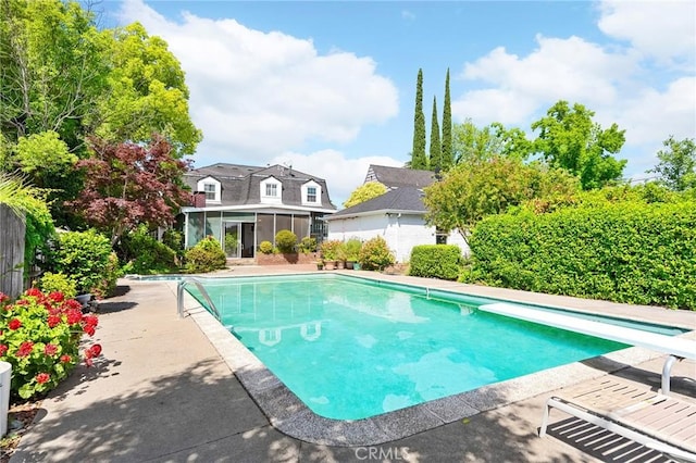1539 Hammon Ave, Oroville, CA 95966 - view of swimming pool with a patio area, a diving board, and a sunroom