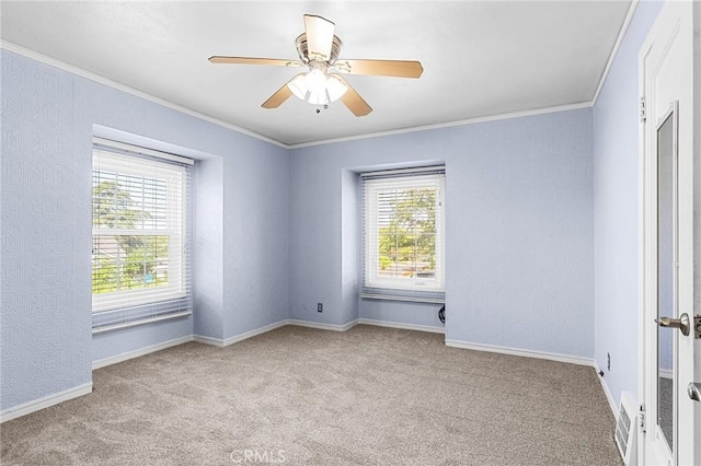 1539 Hammon Ave, Oroville, CA 95966 - carpeted spare room featuring ornamental molding, ceiling fan, and baseboards