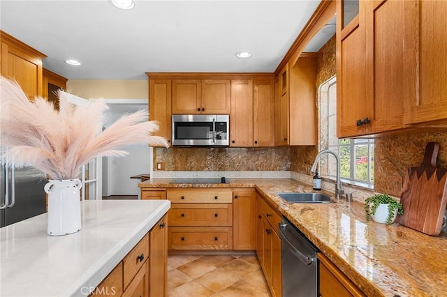 1539 Hammon Ave, Oroville, CA 95966 - kitchen featuring stainless steel appliances, a sink, glass insert cabinets, recessed lighting, and tasteful backsplash