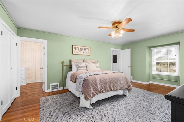 1539 Hammon Ave, Oroville, CA 95966 - bedroom featuring wood finished floors, baseboards, and ceiling fan