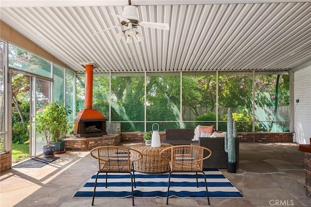 1539 Hammon Ave, Oroville, CA 95966 - sunroom featuring ceiling fan, an outdoor living space with a fireplace, and plenty of natural light