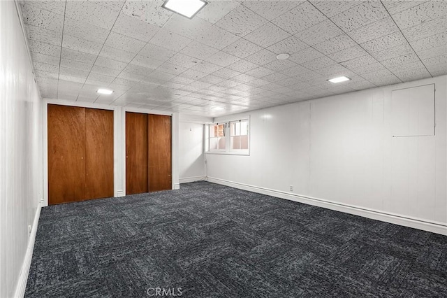 1539 Hammon Ave, Oroville, CA 95966 - unfurnished bedroom featuring dark carpet, baseboards, and multiple closets
