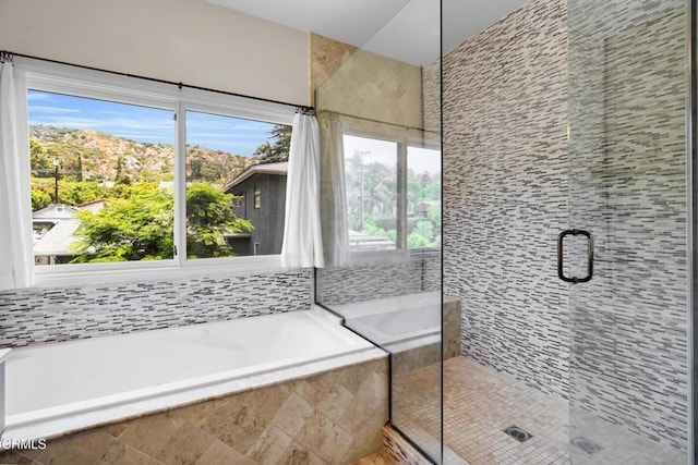 171 N Sunset Pl, Monrovia, CA 91016 - bathroom featuring a stall shower and a garden tub