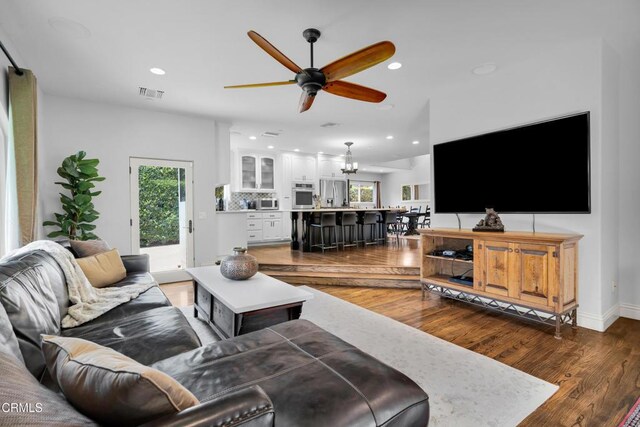 171 N Sunset Pl, Monrovia, CA 91016 - living room featuring ceiling fan, wood finished floors, recessed lighting, and a chandelier