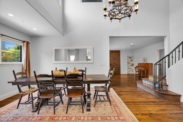 171 N Sunset Pl, Monrovia, CA 91016 - dining space with wood finished floors, stairway, a high ceiling, recessed lighting, and a chandelier