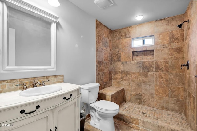 171 N Sunset Pl, Monrovia, CA 91016 - bathroom with vanity, a tile shower, and decorative backsplash