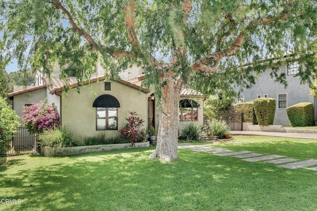 171 N Sunset Pl, Monrovia, CA 91016 - mediterranean / spanish home featuring a tile roof and stucco siding