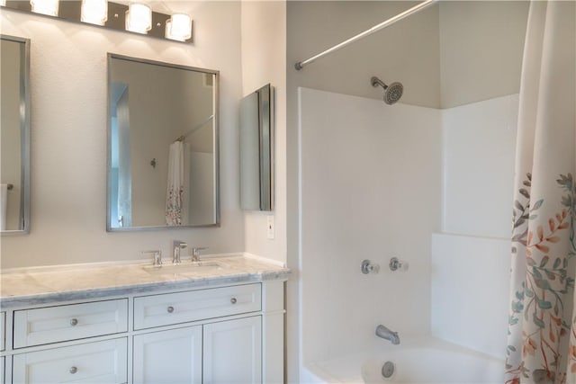 411 San Nicholas Ct, Laguna Beach, CA 92651 - full bathroom with vanity and shower / bath combo with shower curtain